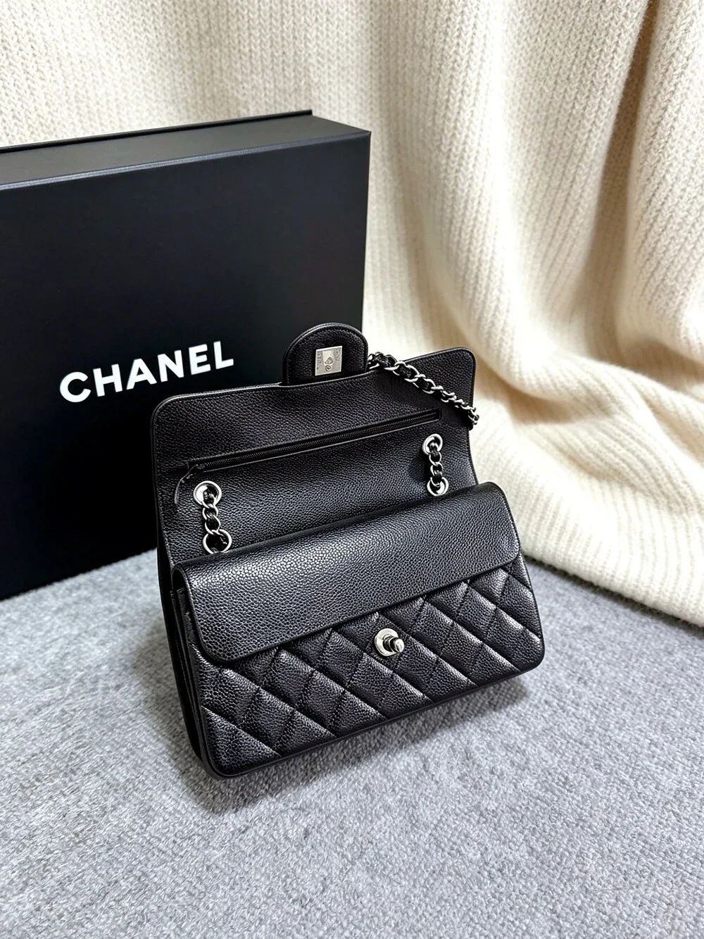 CHANEL Classic Flap Bag in Black Caviar Leather